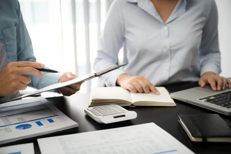 Indian entrepreneurs preparing documents for US business bank account setup
