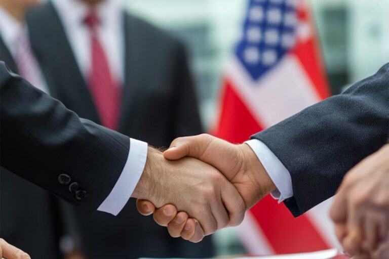 Business professionals shaking hands to finalize international business agreements and cross-border contracts between global companies.