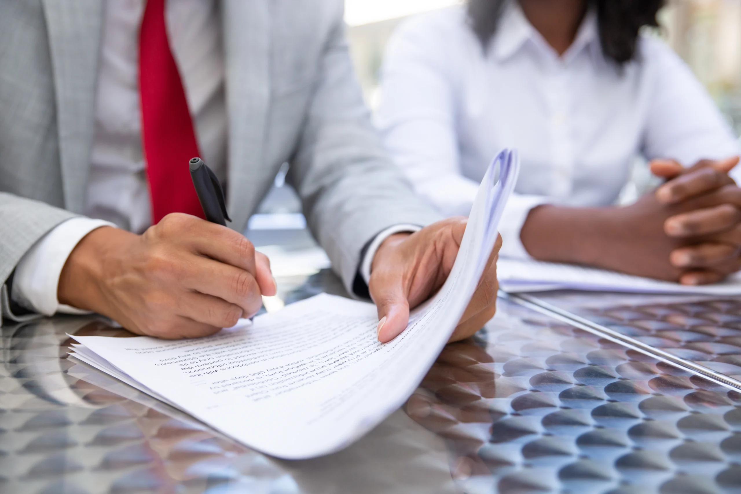 Indian company representatives signing documents for a US subsidiary under RBI Overseas Investment Rules